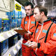 Commanders Scott Dreisen and Alan Wittmer explore a Houston-area Best Buy for possible signs of wireless routers in NASA's heroic first steps into the Wi-Fi Age.
